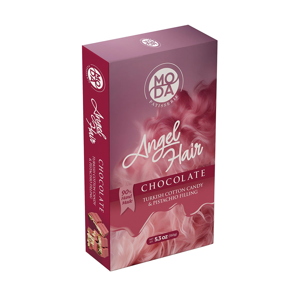 A boxed chocolate candy product standing upright on a plain white background. The package is a rectangular carton with a dusty mauve-pink design, white script reading 'Angel Hair,' and text indicating 'Chocolate' and 'Turkish Cotton Candy & Pistachio Filling.